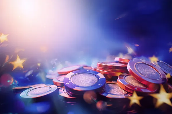 A glamorous woman holding casino chips in a neon-lit environment, representing the premium online casino atmosphere of MALIWIN.